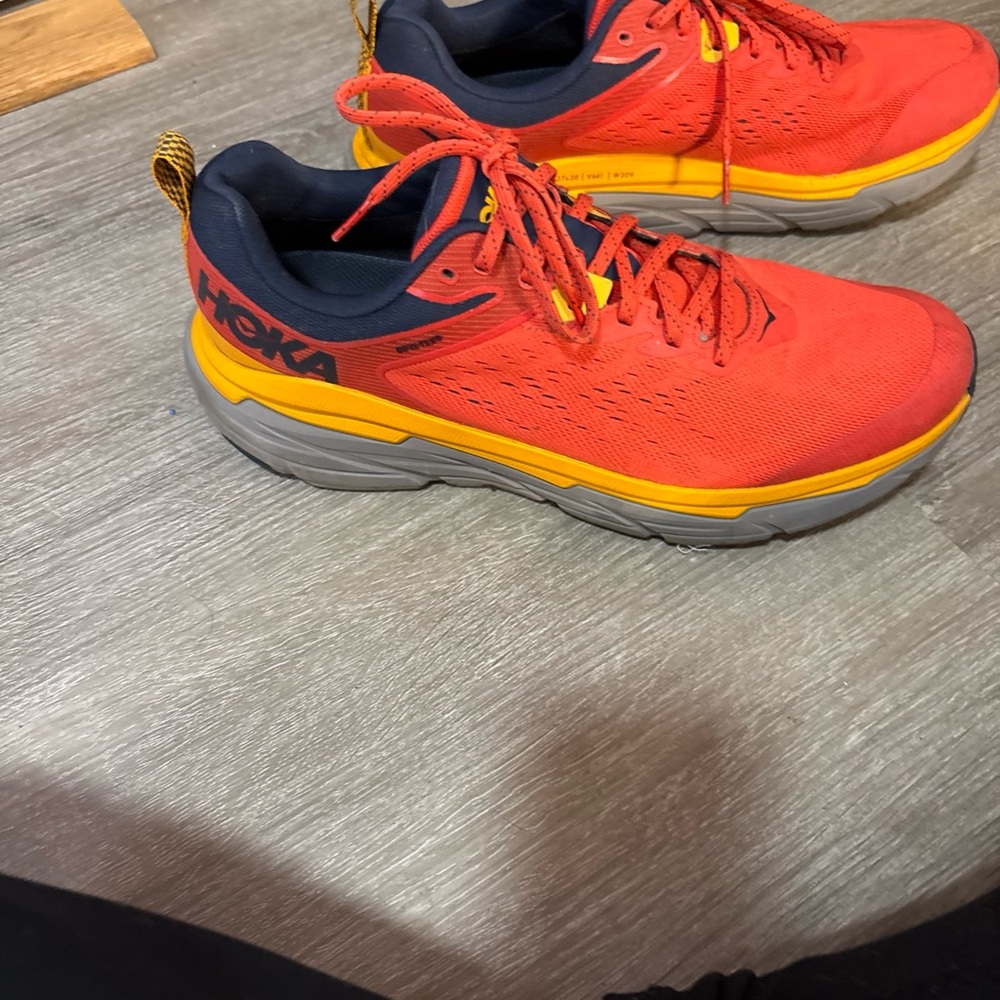 Hoka Red and Gold Athletic Shoes